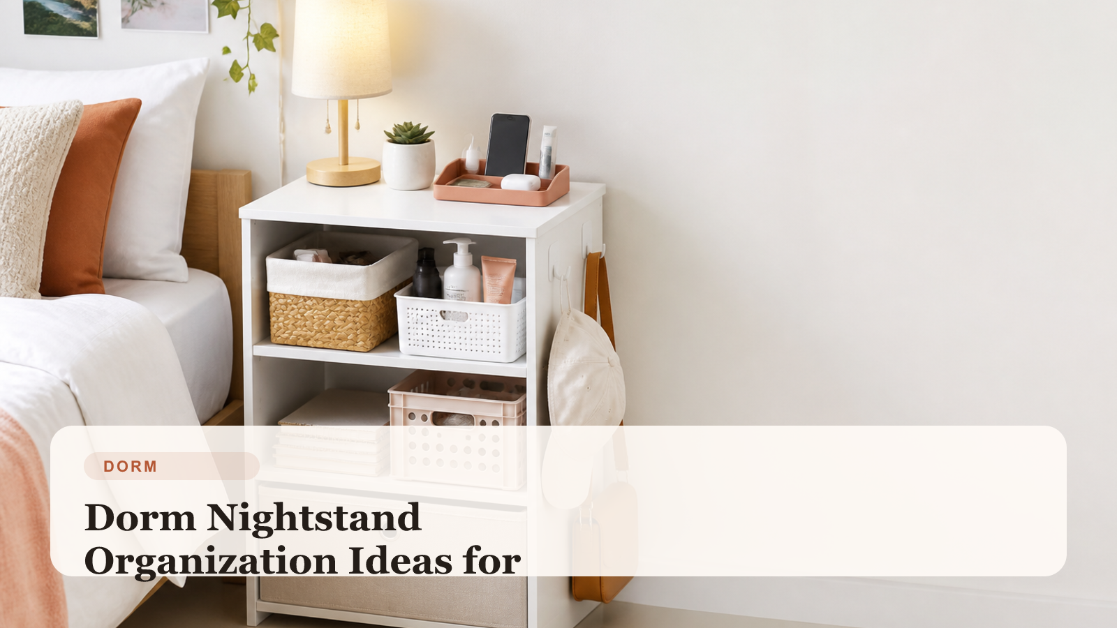 Organized dorm nightstand with a lamp, charging zone, tray, and a few bedtime essentials